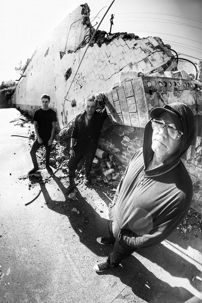 a black and white photo of three members from rock industrial band shadowplay
